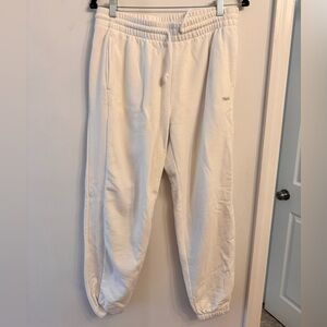TNA Aritiza white sweatpants